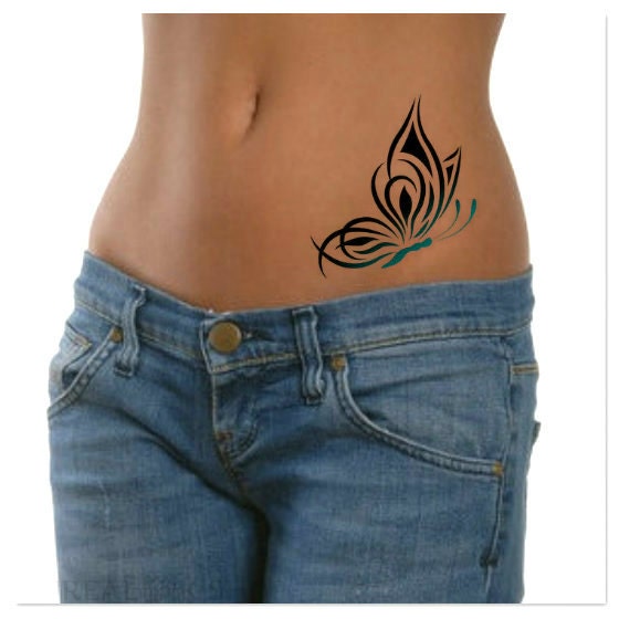 Black & white - love this | Waist tattoos, Butterfly back tattoo, Butterfly tattoo  designs
