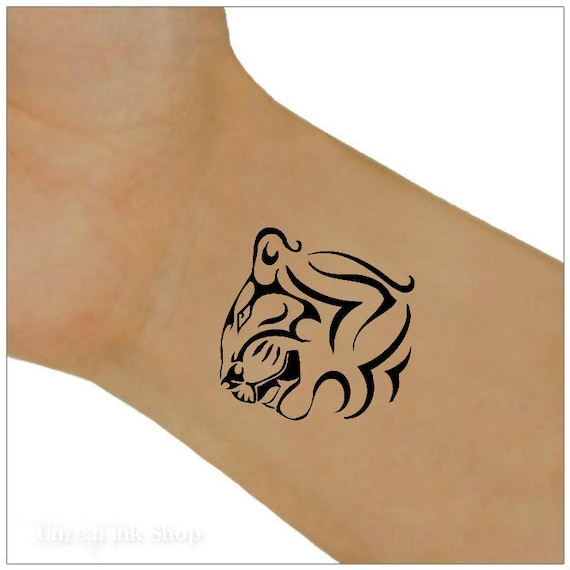 Update more than 131 tiger wrist tattoo