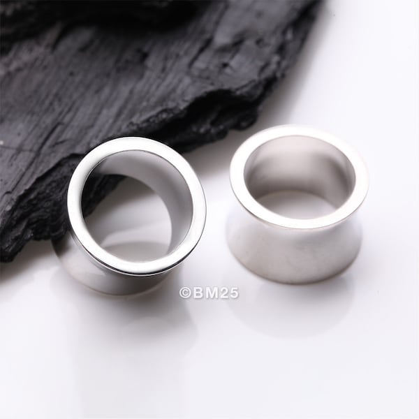 A Pair of Solid Steel Double Flared Ear Gauge Tunnel Plug