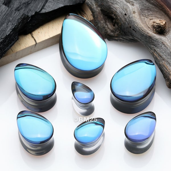 A Pair Of Midnight Moon Iridescent Teardrop Glass Double Flared Ear Gauge Plug