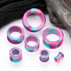 A Pair of Cosmic Flair Camo Flexible Silicone Double Flared Tunnel Plug