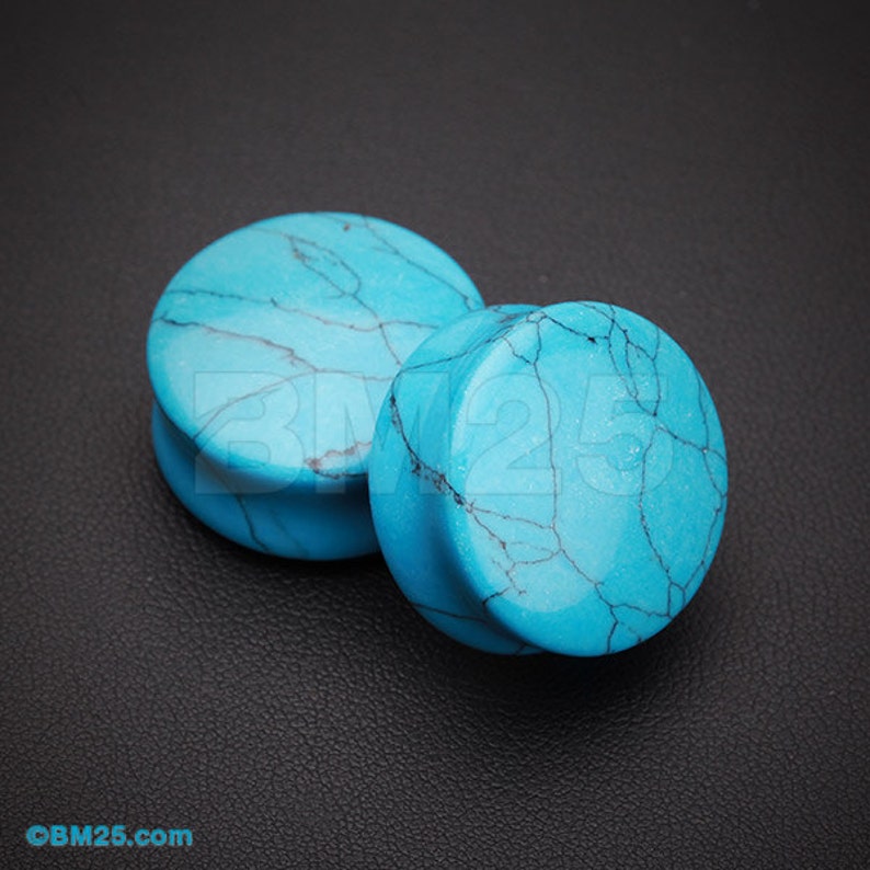 A Pair of Turquoise Stone Double Flared Ear Gauge Plug 