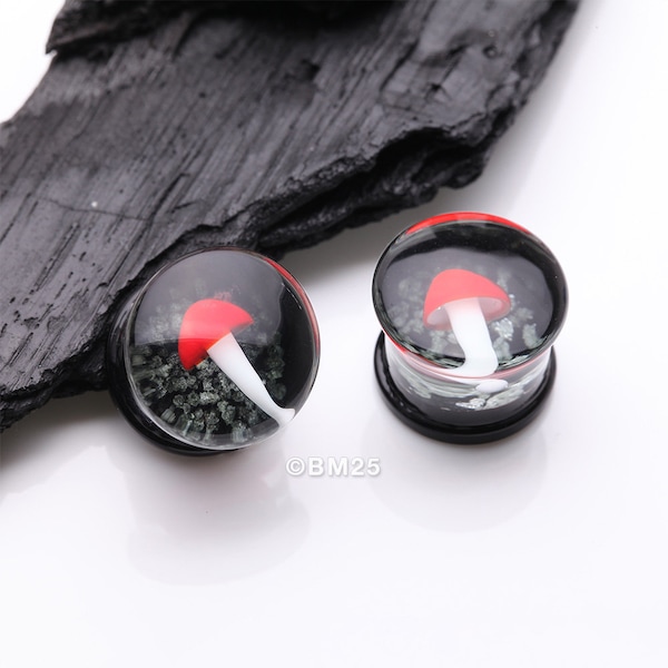 A Pair of Enchanted Red Mushroom Glow in the Dark Double Flared Glass Plug