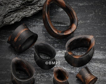 A Pair of Teardrop Tiger Ebony Wood Double Flared Tunnel Plug