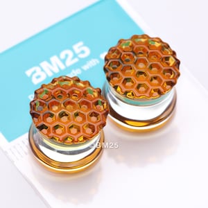 A Pair of Amber Honeycomb Glass Double Flared Plug