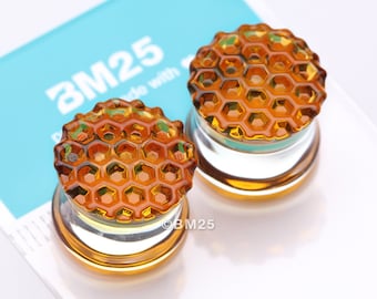 A Pair of Amber Honeycomb Glass Double Flared Plug