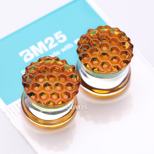 A Pair of Amber Honeycomb Glass Double Flared Plug