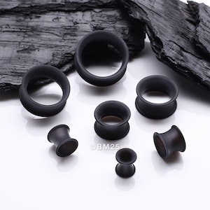 A Pair of Black Flexible Silicone Double Flared Tunnel Plug