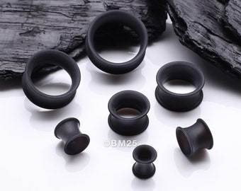 A Pair of Black Flexible Silicone Double Flared Tunnel Plug