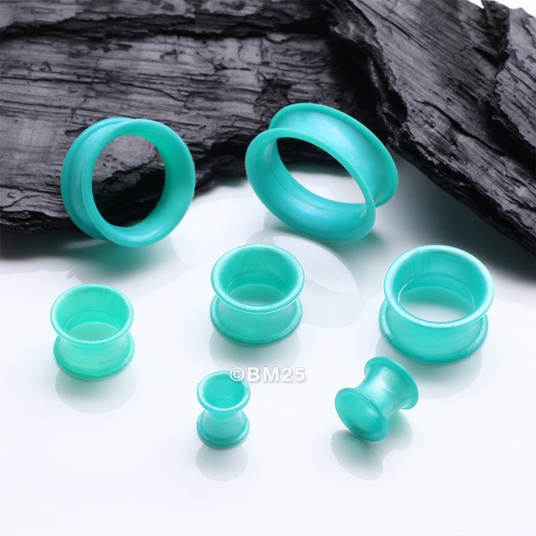 A Pair of Teal Flexible Silicone Double Flared Tunnel Plug