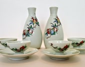Japanese Sake Set 10 Piece Hand Painted Pomegranates On White Porcelain Fertility Symbol 2 Bottles 4 Footed Cups 4 Saucers Rice Wine 1960s