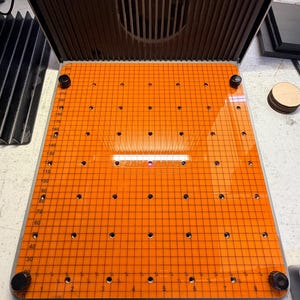 May include: A set of three ceramic mugs with a speckled, matte finish. The mugs are in shades of cream, light gray, and dark gray. Each mug has a simple, minimalist design, perfect for coffee or tea.