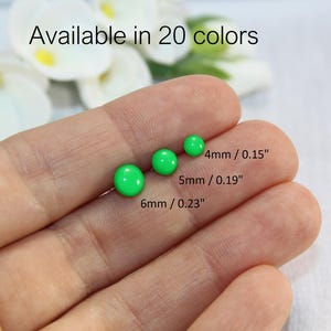 May include: Three green round beads in different sizes, 4mm, 5mm, and 6mm, with measurements in inches. Available in 20 colours.