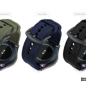 May include: Three different colored nylon watch bands for a Samsung Gear smartwatch. The bands are army green, navy blue, and stealth black.