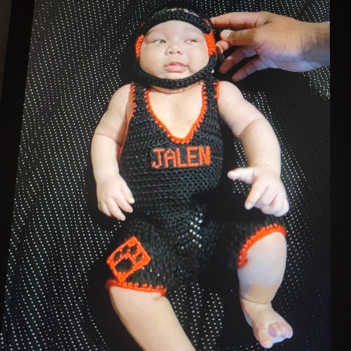 Crochet wrestling outfit for 0 to 3 month size only. Singlet,headgear. Can be customized with your team or coaches name on singlet
