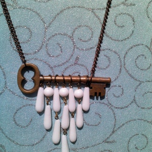 25% OFF Antique Sideway Skeleton Key Bib Necklace: White Beads Upcycled From a Vintage Clip Earring. Perfect Wedding Day Bridal Necklace.