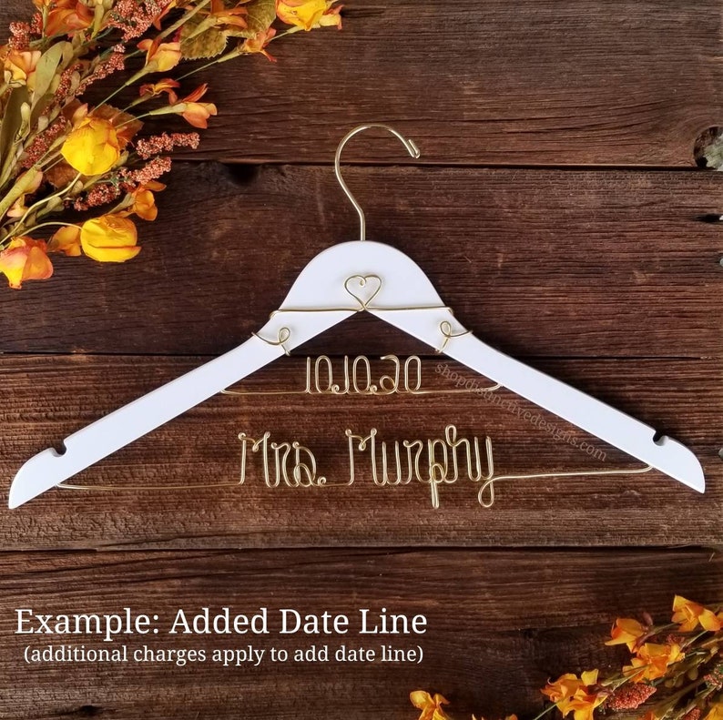 Custom Bridal Dress Hanger - Personalize your wedding dress display with our custom wire hangers. Featuring your name or date in elegant wire, these hangers are perfect for your dress and make a wonderful bridal gift for beautiful wedding photos.