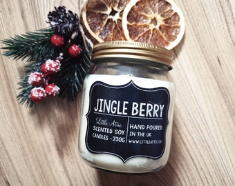 Vela especiada de naranja y frutos rojos, aroma navideño, fragancia festiva