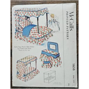 May include: Vintage McCall's printed pattern 1658 for a doll's four-poster bed, dressing table, and stool. The illustrations show the doll furniture with a floral pattern in red and white on a white background, with blue accents.