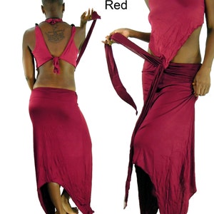 May include: A two-piece red outfit. The top is a halter style with a tie at the back. The skirt is a long, flowing design with an asymmetrical hemline. The outfit is made of a soft, draping fabric. The word "Red" is in the image.