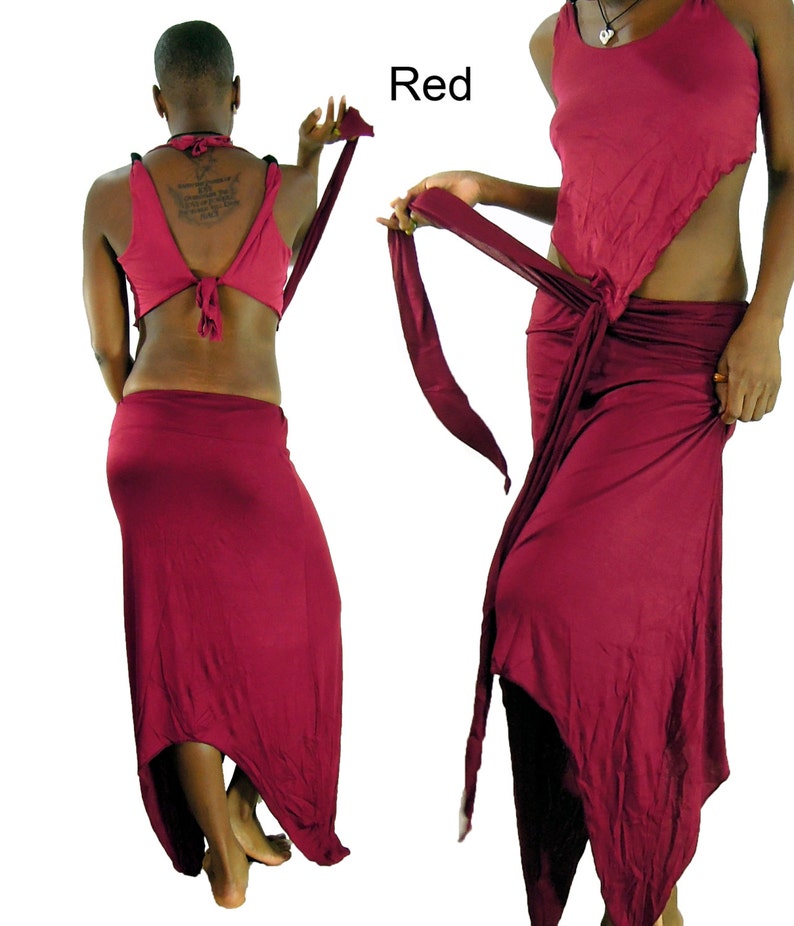 May include: A two-piece red outfit. The top is a halter style with a tie at the back. The skirt is a long, flowing design with an asymmetrical hemline. The outfit is made of a soft, draping fabric. The word "Red" is in the image.