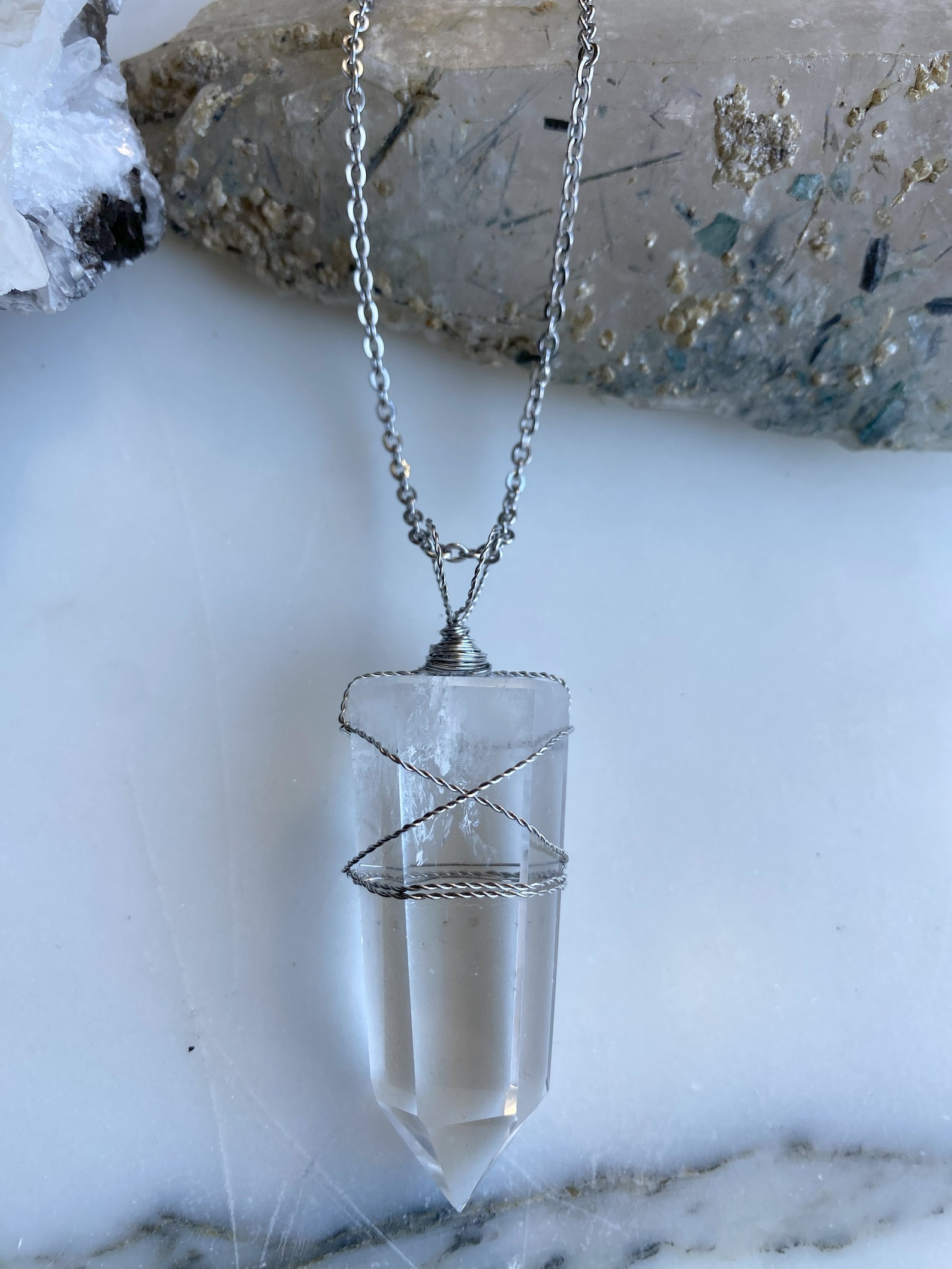 clear-quartz-crystal-point-pendant-stainless-steel-wire-wrapped