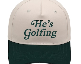 He's Golfing Trucker Hat 0423