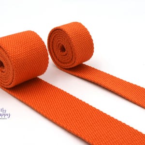 Orange Cotton- 1 inch (25mm) or 1.5 inch (38mm) width  Webbing- Strapping by the yard. Great for bags and totes!!