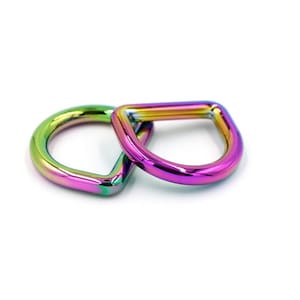 May include: Two iridescent rainbow-colored metal D-rings. The rings are stacked on top of each other.