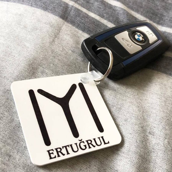 dior kaws keychain