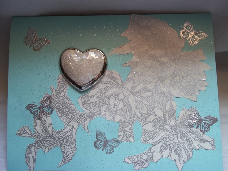 Liz Claiborne silver metal and faux mother of pearl hear shaped brooch greeting card. marked LC