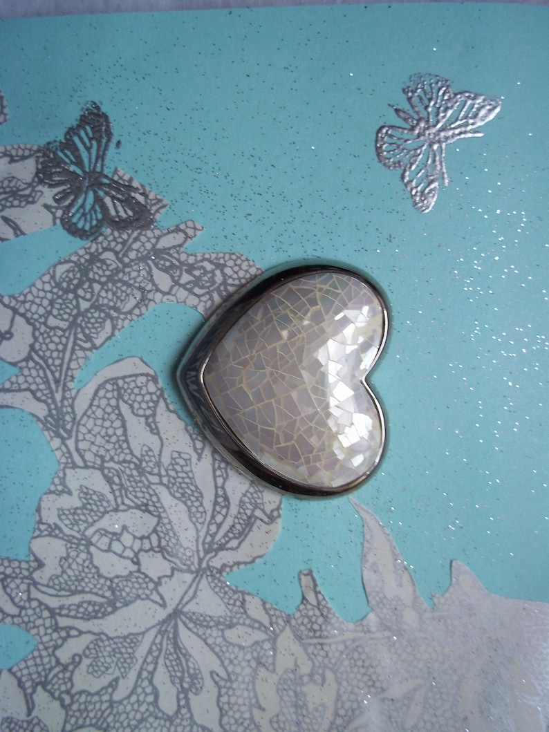 Liz Claiborne silver metal and faux mother of pearl hear shaped brooch greeting card. marked LC