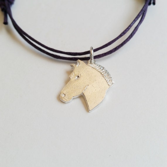 Items similar to Solid Silver Horse Charm on Cotton Braid, Adjustable Silver Charm Bracelet