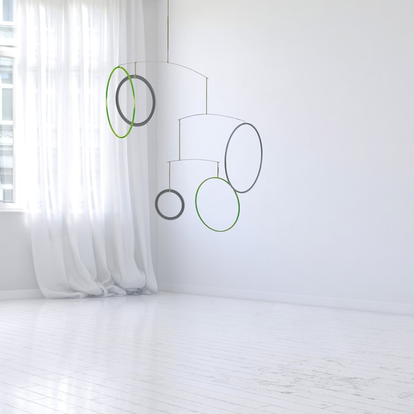 Raundo - Modern mobile for adults. Uncluttered decoration for living and working spaces in green and white, transparent