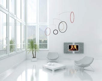 Raundo - Modern mobile for adults. Simple decoration for living and working spaces in the colors black, white and red.