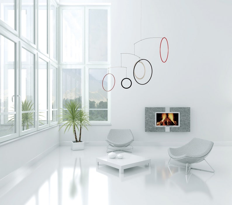 Raundo Modernes Mobile für Erwachsene. Schlichte Dekoration für Wohn und Arbeitsräume in den Farben Schwarz, Weiß und Rot. Bild 1