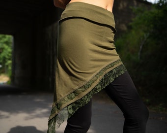 Jerseyrok "Mina", asymmetrische jerseyrok met kant en elastische manchetten.