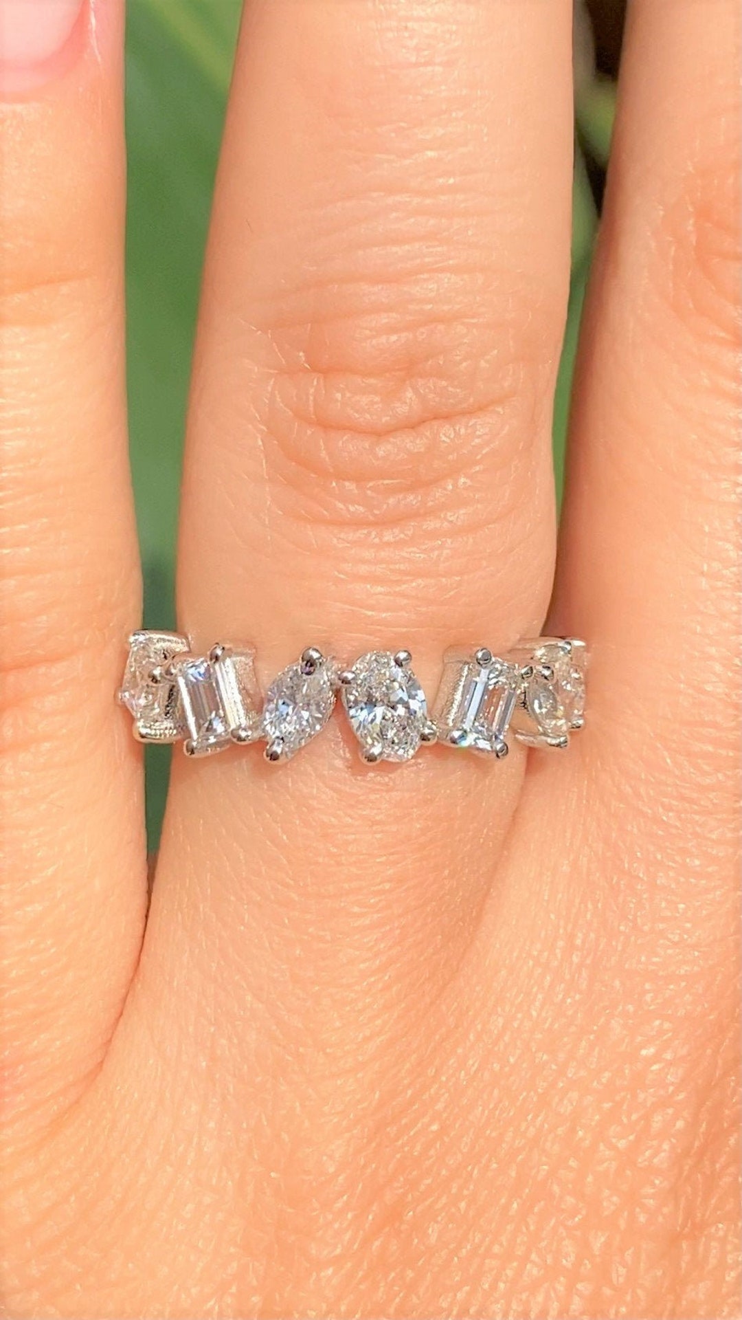 Multi shape clearance eternity band