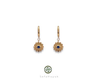 Boucles d'oreilles oeil de Tenniel