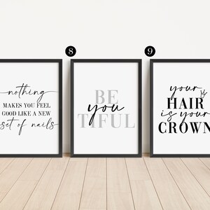 May include: Three black framed prints with white backgrounds and black text. The first print says "nothing makes you feel good like a new set of nails". The second print says "Be you tiful". The third print says "your hair is your crown" with a crown symbol.