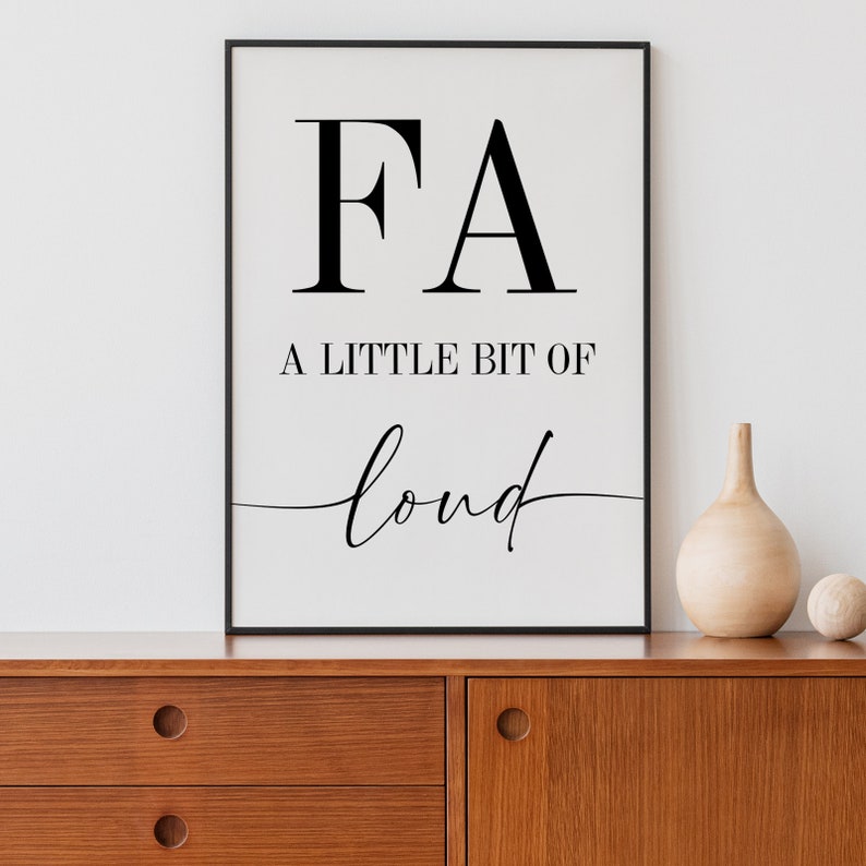 May include: Black and white printable wall art with the text "FA A little bit of loud" in a modern minimalist style.