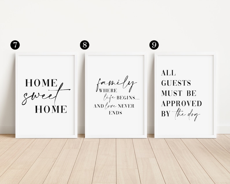 Puede incluir: Tres impresiones enmarcadas blancas con texto negro. La primera impresi&oacute;n dice "Home sweet home". La segunda impresi&oacute;n dice "Family where life begins... and love never ends". La tercera impresi&oacute;n dice "All guests must be approved by the dog".