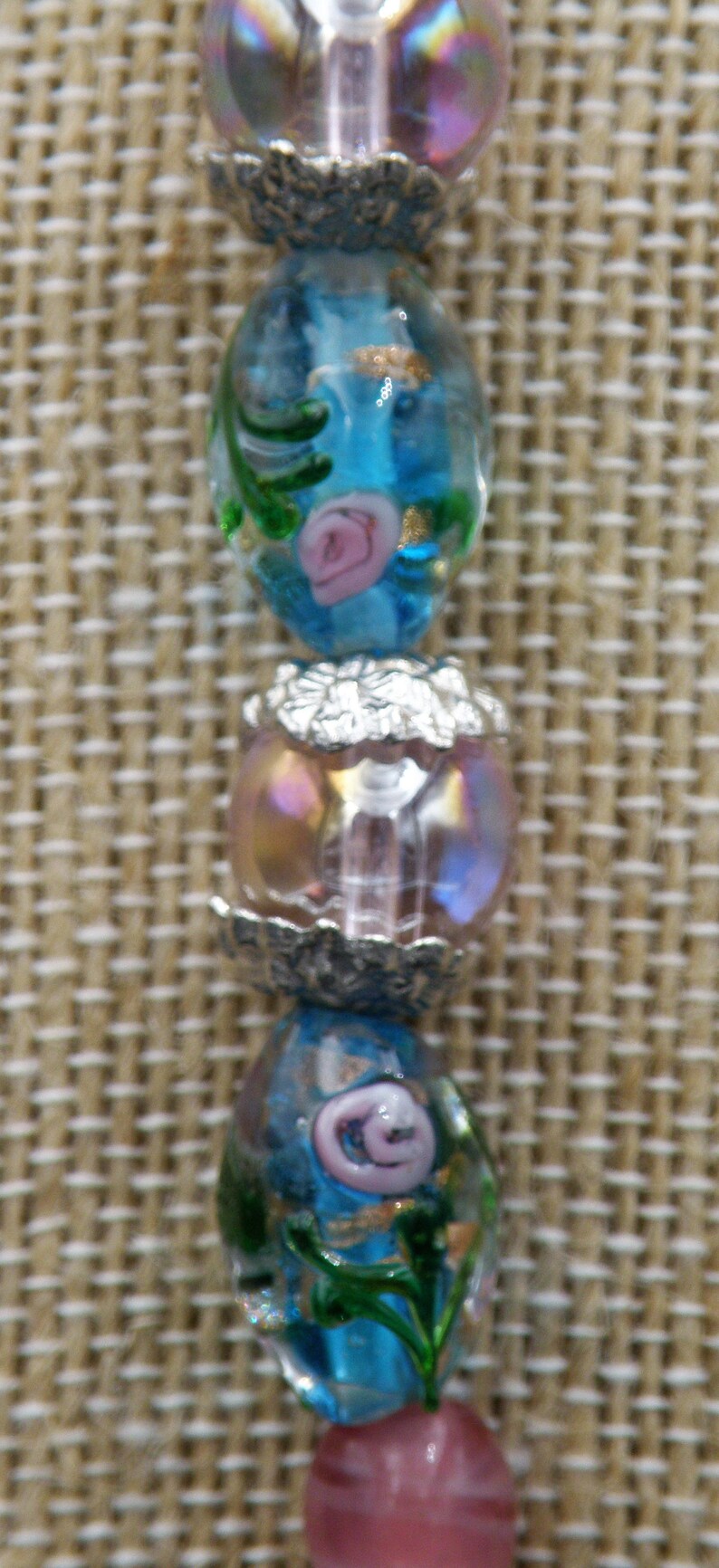 Silver Spacers Hook Closure 26 Necklace of Opalescent Pearl Beads wBlue Oblong Beads wPink Roses Embedded