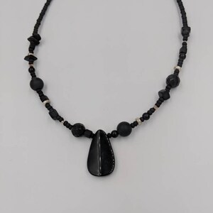 Onyx and black howlite necklace with silver beads.