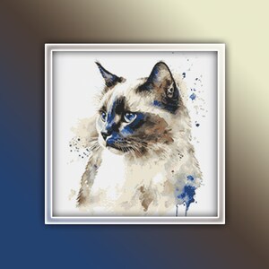 May include: A watercolor painting of a Siamese cat with blue eyes. The cat is looking to the right of the image. The background is white with blue watercolor splatters.