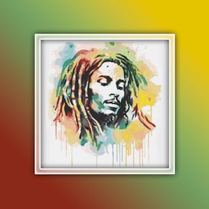 May include: A watercolor painting of Bob Marley with a colorful background. The painting is in a white frame.
