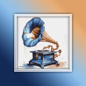 May include: A vintage blue and gold gramophone with a large horn. The gramophone is sitting on a white background with water droplets around it.