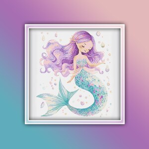 May include: A purple-haired mermaid with a turquoise and green tail swims in a sea of white with pink and gold bubbles.