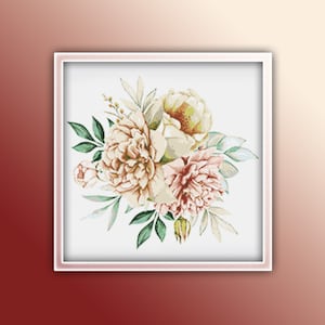 May include: A framed cross-stitch design featuring a bouquet of peonies. The flowers are in shades of cream, peach, and pink, with green leaves. The artwork is set against a white background and framed in a white square.