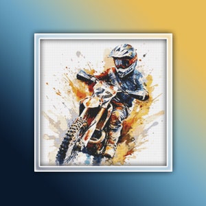May include: A watercolor illustration of a motocross rider in a blue and black racing suit, helmet, and goggles, riding a dirt bike through a splash of orange and yellow paint.